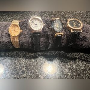 4  designer watches. All need batteries and bands needs repaired. Very pretty